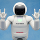 “I love you,” it signs. No, robot, you don’t. Image via Honda/ASIMO.